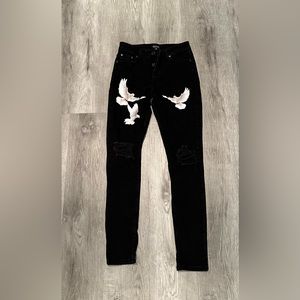 Black jeans with a dove design, size 30 waist